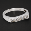 086 silver ring with clear gemstones close up