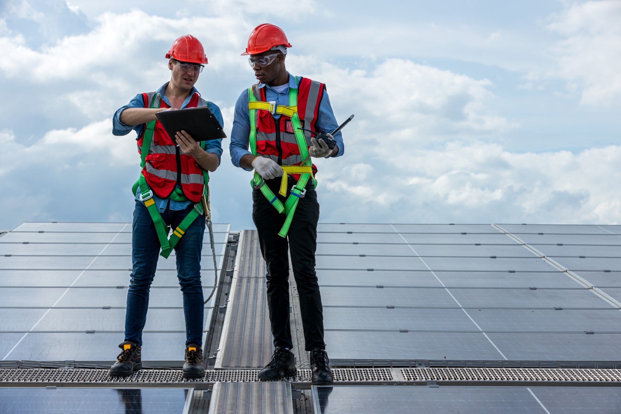 engineer-working-setup-solar-panel-at-the-roof-top-2023-01-10-06-44-59-utc