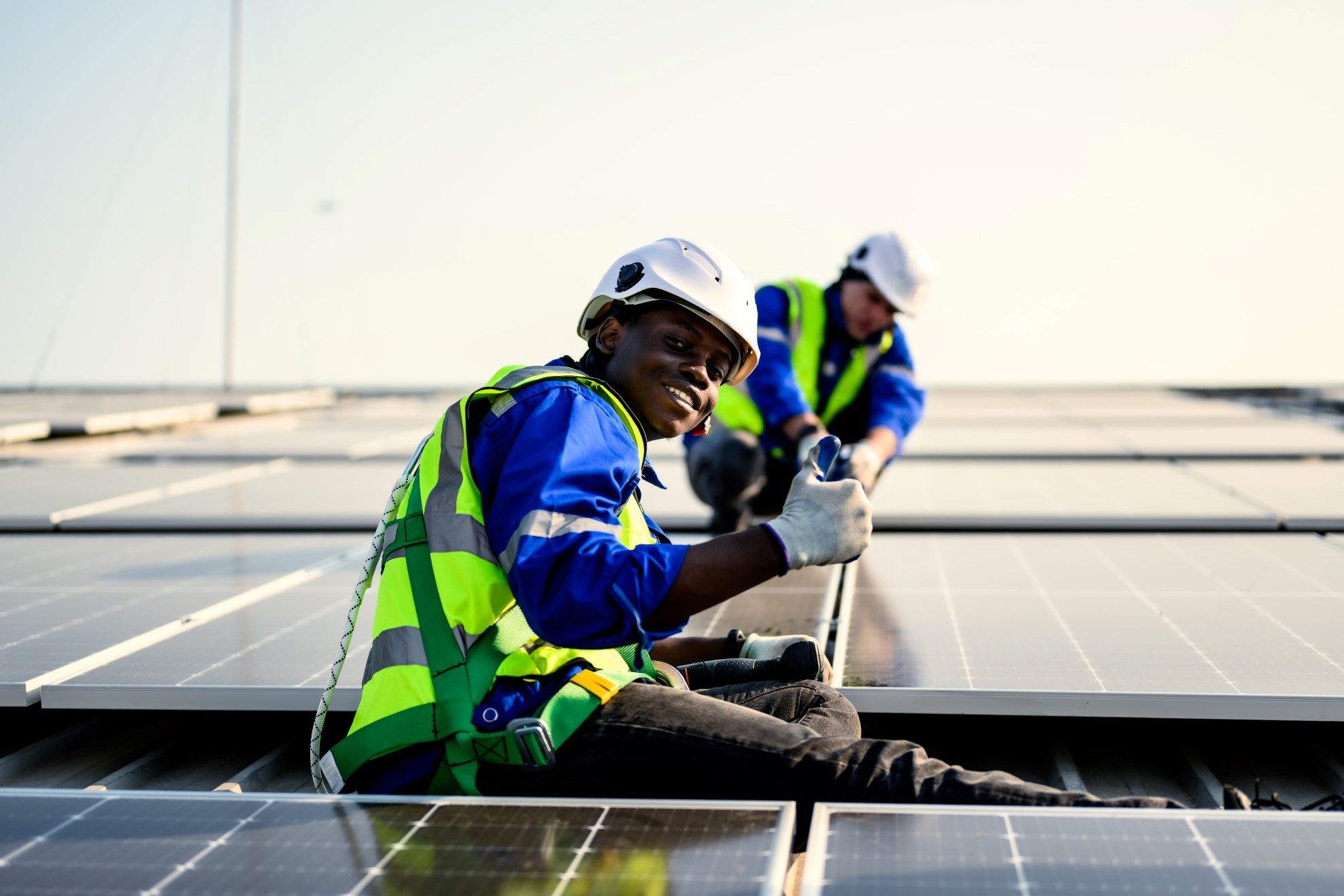 maintenance-technicians-installing-solar-panels-at-2023-09-21-22-02-19-utc