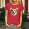 Dámské tričko s detailním realistickým potiskem hlavy usměvavého psa plemene Welsh Corgi Pembroke.