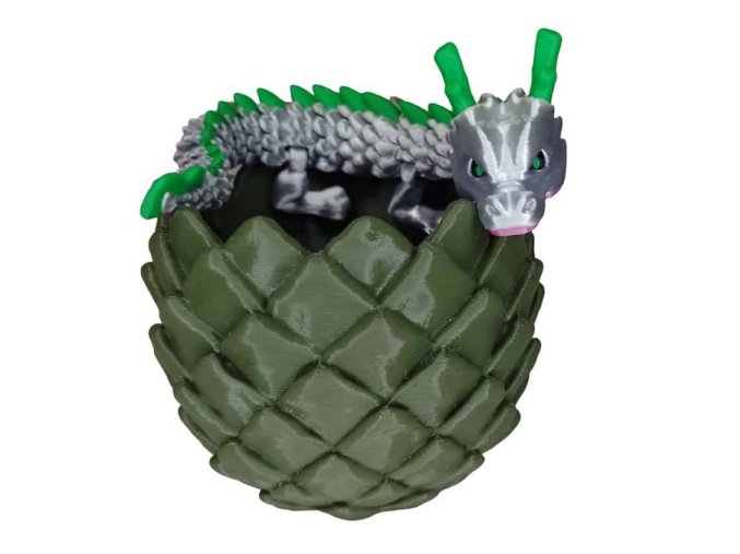 Malý stříbrný drak ve vejci