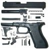shows a fully disassembled Glock pistol however the basic field stripping procedure is