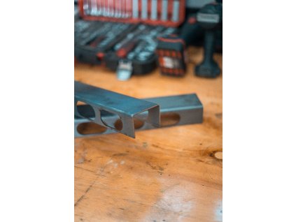 Držák závodních sedaček