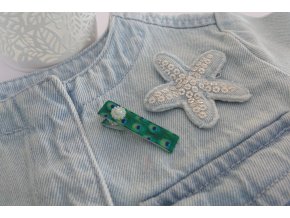 Sponečka s motivem pavích per