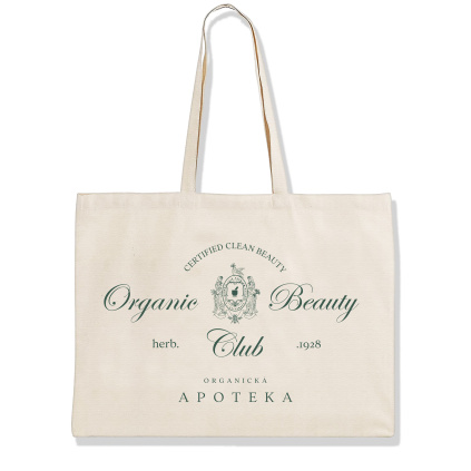 Velká bavlněná taška se zelenými nápisy a logem na bílém pozadí.