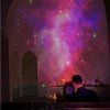 Projektor nočnej oblohy - astronaut s gitarou
