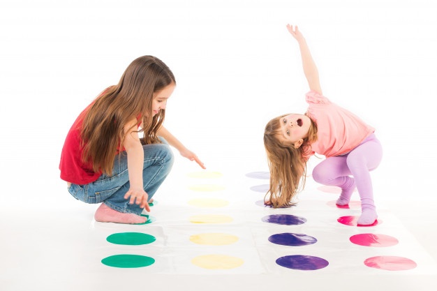 two-happy-girls-play-twister-game_212944-293