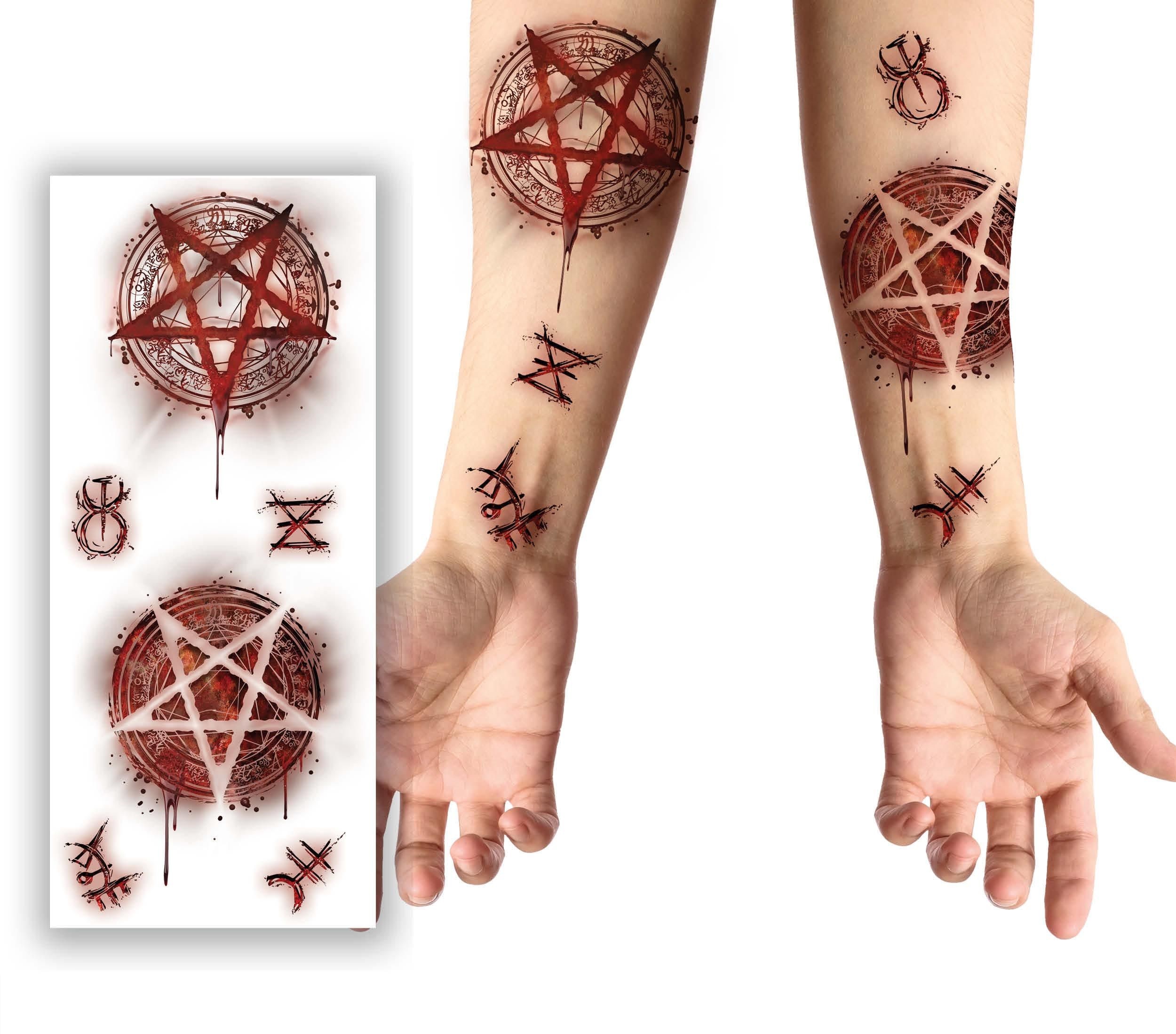 Guirca Sada tetovaní - Satanistické symboly