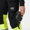 Dámské reflexní kalhoty ALNA 4X HH CONNECT CLASS 1  Helly Hansen - ŽLUTÁ/EBEN 6/8