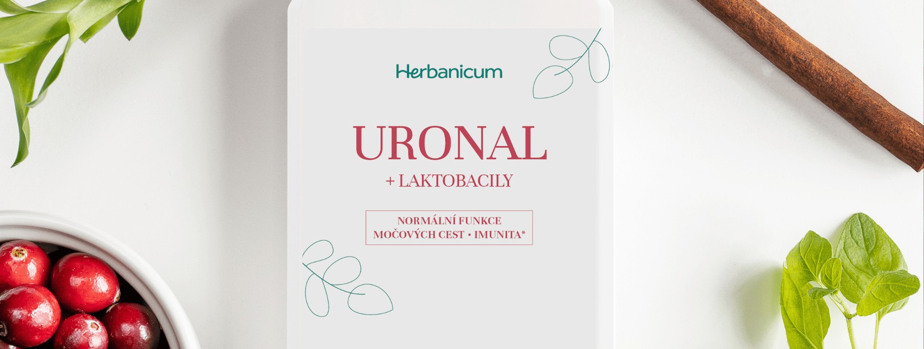 Obrázek doplňku URONAL se skořicí, brusinkami, bambusem a oregánem na bílém pozadí.