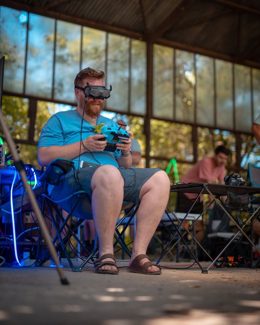 Jakub Jícha wearing FPV goggles at a race