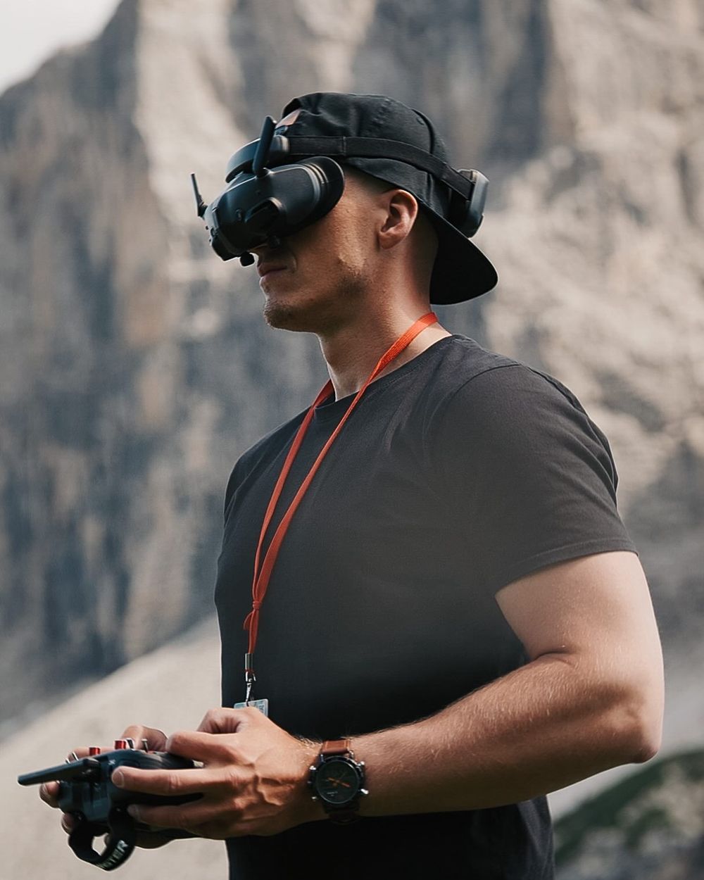Marek Hošta wearing FPV goggles in the mountains