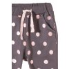 Kojenecké puntíkaté tepláky s kapsami