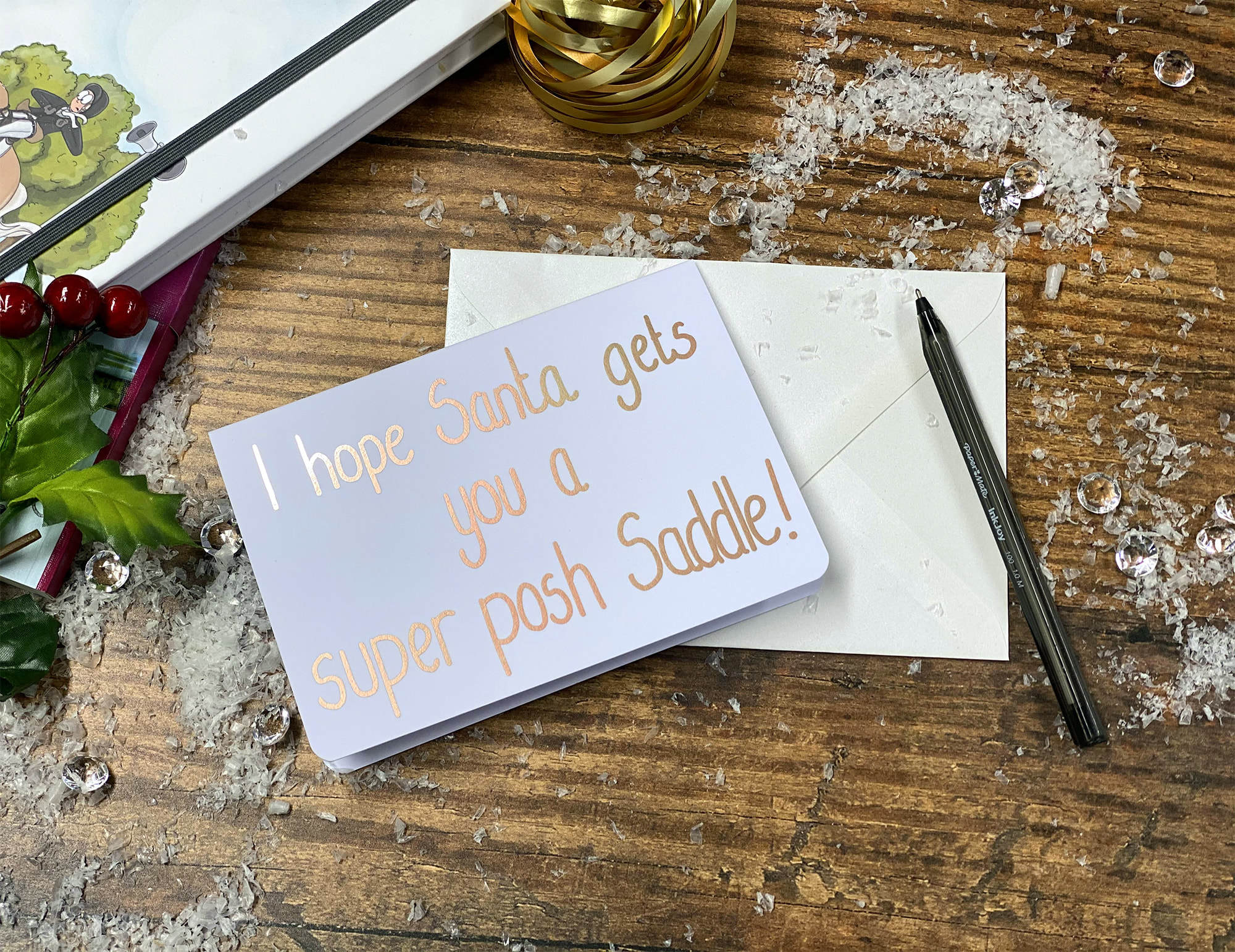 Vánoční přáníčko 'I hope Santa gets you a super posh Saddle!' od Emily Cole