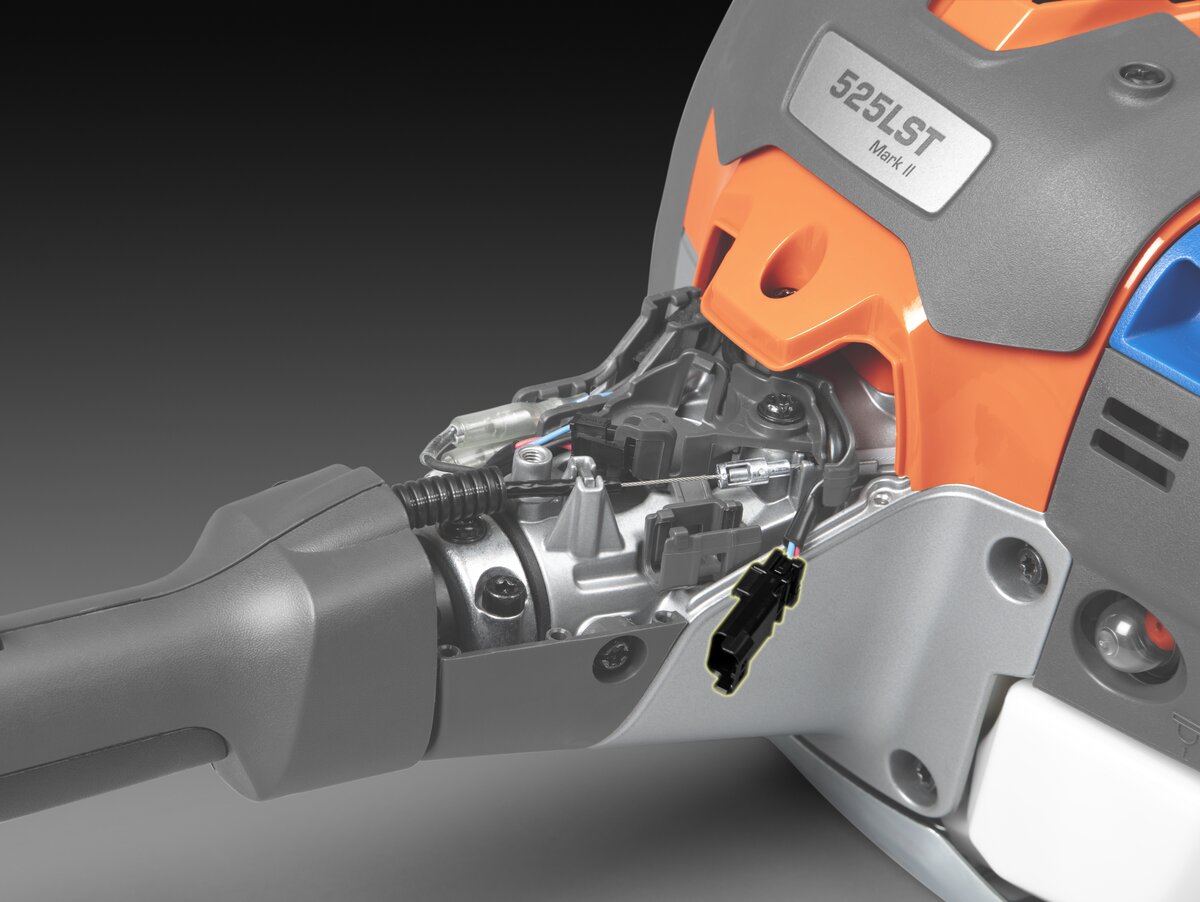 Benzínový krovinorez Husqvarna 525RX Mark II má integrovaný servisný port