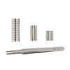 Magnets with anti-magnetic tweezers