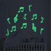 Fluorescentní dekorace s hudebními symboly