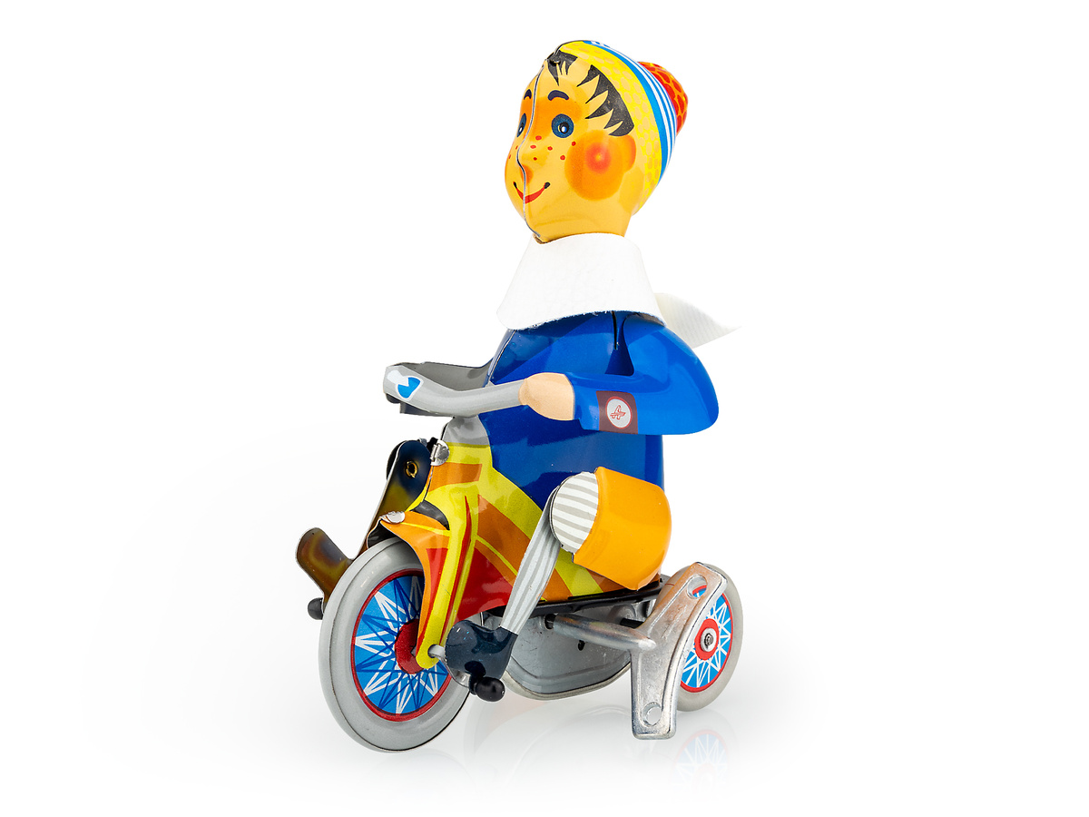 Kluk na tříkolce na klíček kov 15cm v krabici Kovap