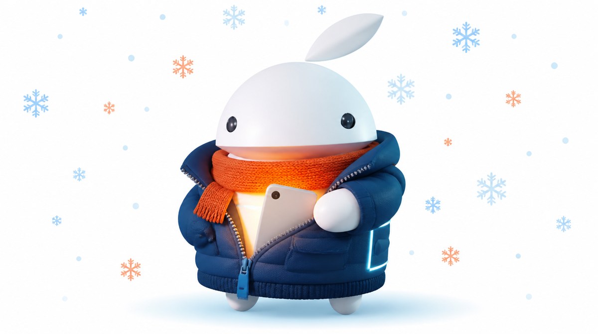 Maskot iguru.sk v zimnej bunde chráni telefón pred mrazom vo vnútornom vrecku