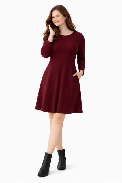 Model in burgundy dress on white background