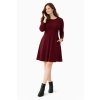 Model in burgundy dress on white background