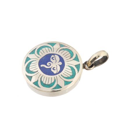 Kovový vykládaný amulet Buddhovy oči z Nepálu