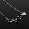 silver stethoscope black background
