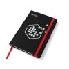 Black notebook with red rubber band