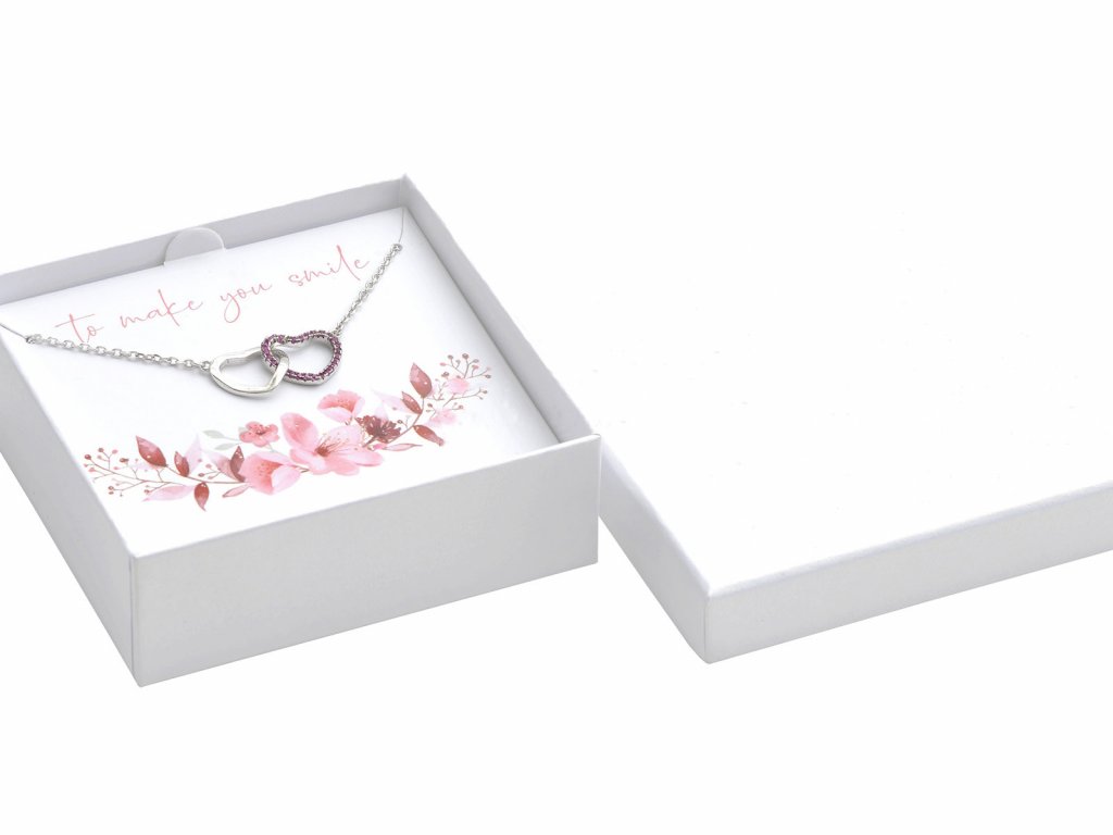 Bílá papírová krabička s věnováním na střední sadu šperků