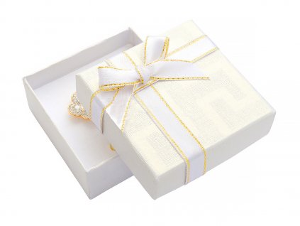 Biela papierová krabička s mašľou so zlatým okrajom na malú sadu