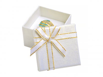 Biela papierová krabička s mašľou so zlatým okrajom na prsteň alebo náušnice