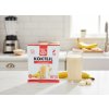 Create a nice image in a kitchen setting with the banana protein cocktail package from subject 1 p