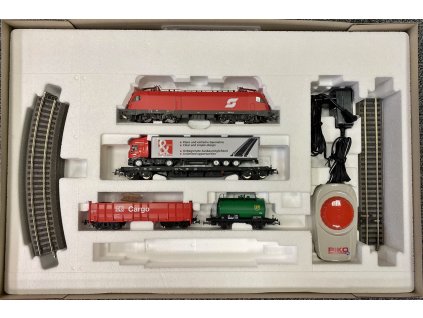 H0 - Start Set - El. lokomotiva ÖBB Taurus, nákladní vozy, kamión, koleje s podložím / PIKO 57177