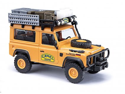 H0 - Rover Defender 90, Camel Trop / BUSCH 54311