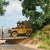 H0 - Rover Defender 90, Camel Trop / BUSCH 54311