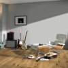 drevena podlaha parador classic 3025 dub 1744852 v interieri s gitarami