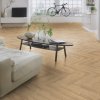 laminatova podlaha kronooriginal herringbone 8 dub sundance v obyvacke s bicyklom 22896