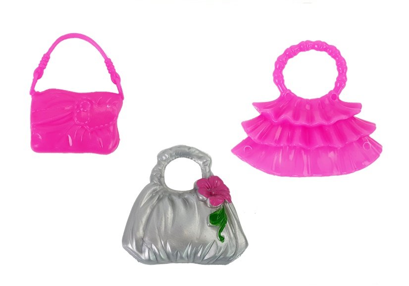 Lila ruhás baba kiegészítőkkel 28 cm