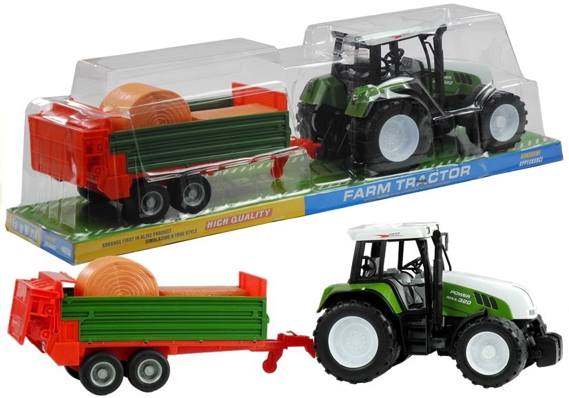Zöld traktor pótkocsival