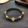 minerální náramek černá láva a zlatý broušený hematit se zlatým panterem se zirkony