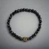 náramek fasetová kulička hematit černý s oddělovacím korálkem kostkou se zirnony zlatá ze zhora