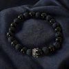 náramek černý minerální s lávovým kamenem a onyxem s korunkou