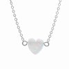 Ocelovy nahrdelnik s priveskem srdce ze syntetickeho bileho opalu