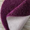 Okrúhly fialový shaggy koberec Kamel