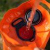 Malá bateriová sprcha s nádrží Flextail TINY Shower Bucket