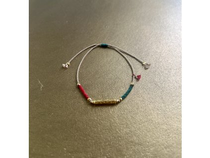 Náramek z hedvábné šňůrky se zlacenou trubičkou Ag925