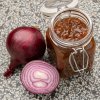 2034 3 glass jar with caramelized red onion chutney and a 2025 03 23 20 00 11 utc