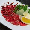 beef carpaccio with cheese white bread toasts and 2025 01 08 04 13 38 utc