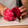 closeup of a person cutting a red dragon fruit in 2025 02 06 05 36 10 utc