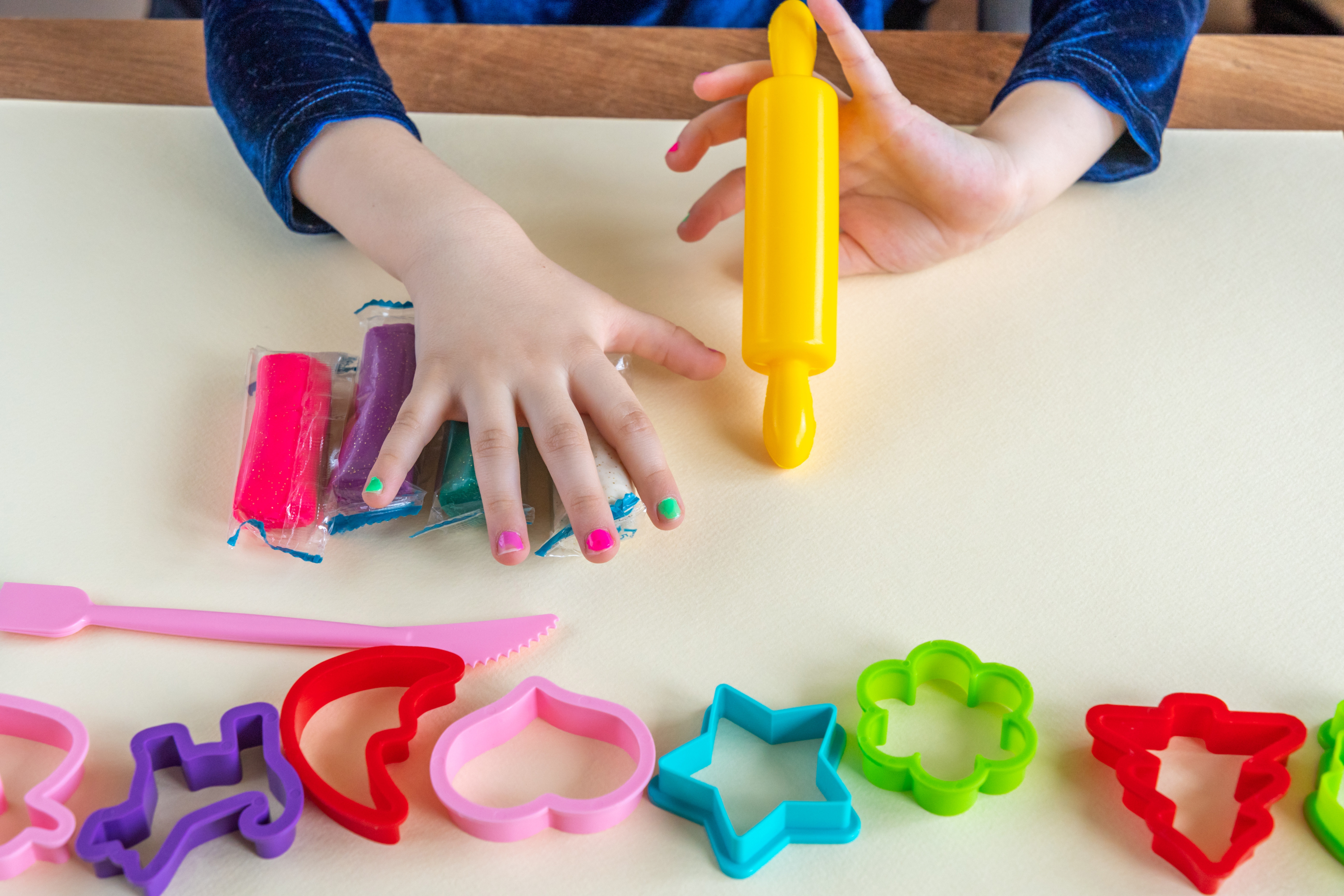 girl-toddler-hands-playing-colorful-play-dough-wit-2022-01-26-18-01-08-utc